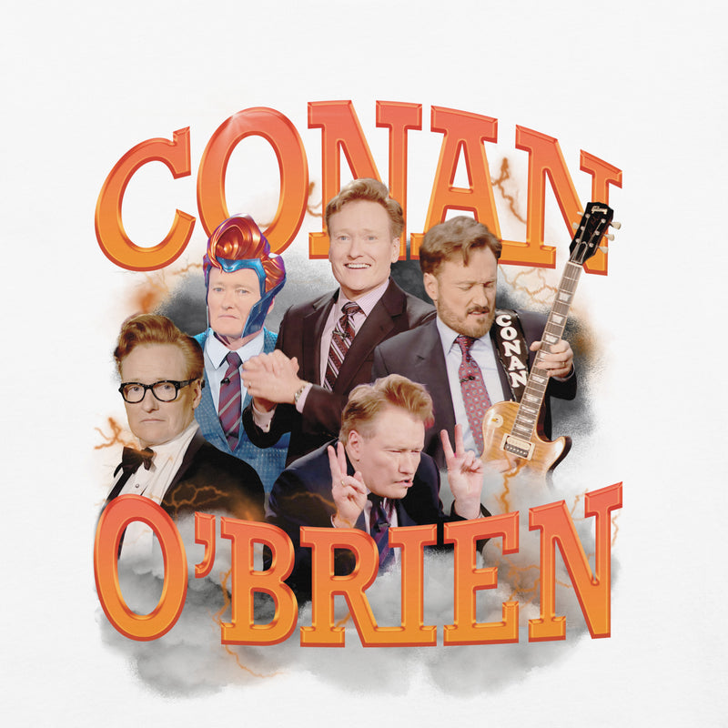 A close-up of the Conan O'Brien graphic design on the white t-shirt, highlighting detailed images of Conan in various poses with bold, orange 3D lettering that reads CONAN O'BRIEN,' surrounded by a cloudy, lightning-like background.