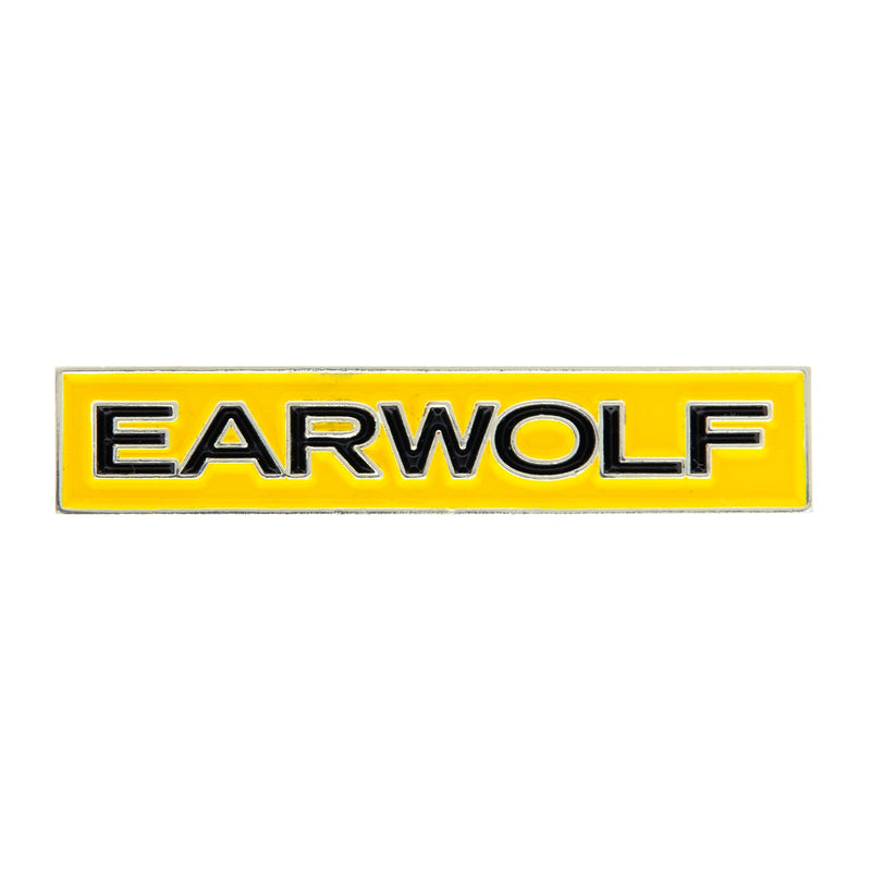 Earwolf logo enamel pin in black text on a yellow background, rectangular shape.