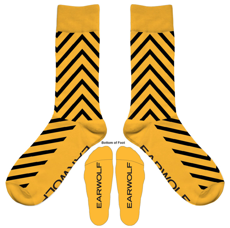 yellow socks with black chevron pattern and EARWOLF logo on the bottom of the foot