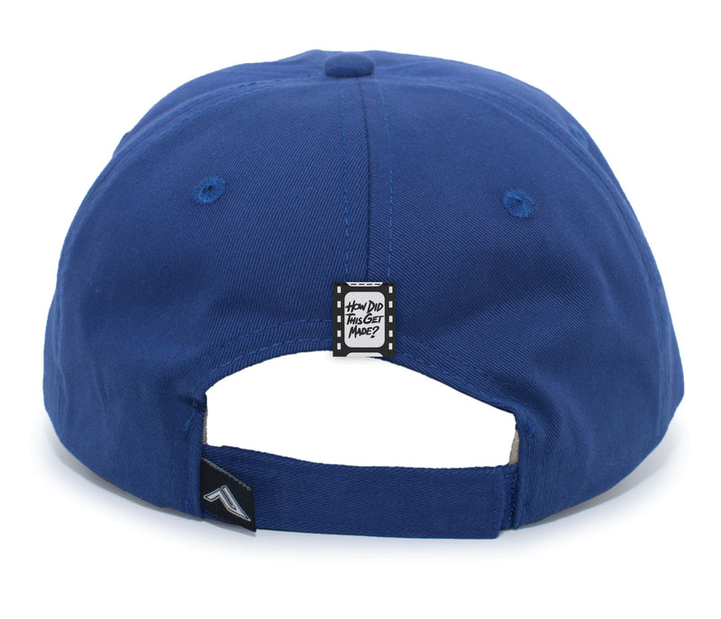 The royal blue baseball cap viewed from the back. It features an adjustable strap and a small black tag with white text reading 'HOW DID THIS GET MADE?' sewn onto the back of the cap, resembling a film strip design.