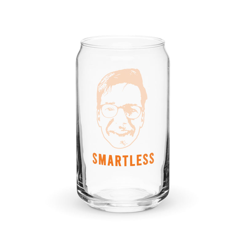 A clear glass featuring a printed illustration of a face and the word 'SMARTLESS' in bold orange letters.