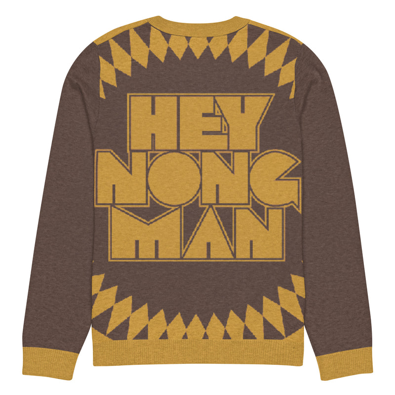 Sweater featuring the phrase 'HEY NONG MAN' in bold gold letters on a brown background, with a patterned geometric design along the bottom.