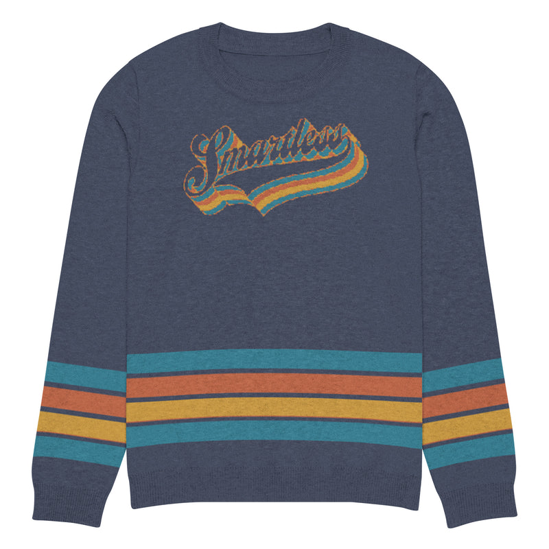 Navy sweater with 'Smartless' text in a retro font, featuring multicolored stripes at the hem and cuffs.