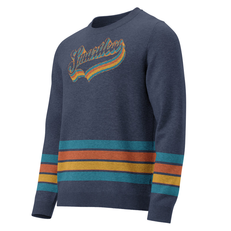 A dark blue sweater with a colorful striped pattern at the bottom and a retro-style 'SmartLess" logo on the front.