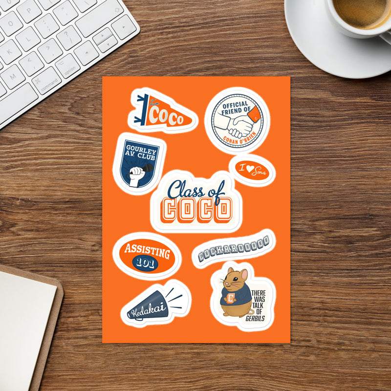 Colorful stickers featuring phrases like Class of Coco, Assisting 101, and images of a gerbil and microphone on an orange background.