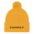 Bright yellow beanie hat with a pom-pom on top and the word 'EARWOLF' in black text on the cuff.