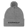 Grey beanie hat with a pom-pom on top and the word 'EARWOLF' in black text on the cuff.