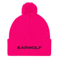 Bright pink beanie hat with a pom-pom on top and the word 'EARWOLF' in black text on the cuff.