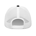 Back view of a white mesh baseball cap with a black button on top and a white adjustable strap.