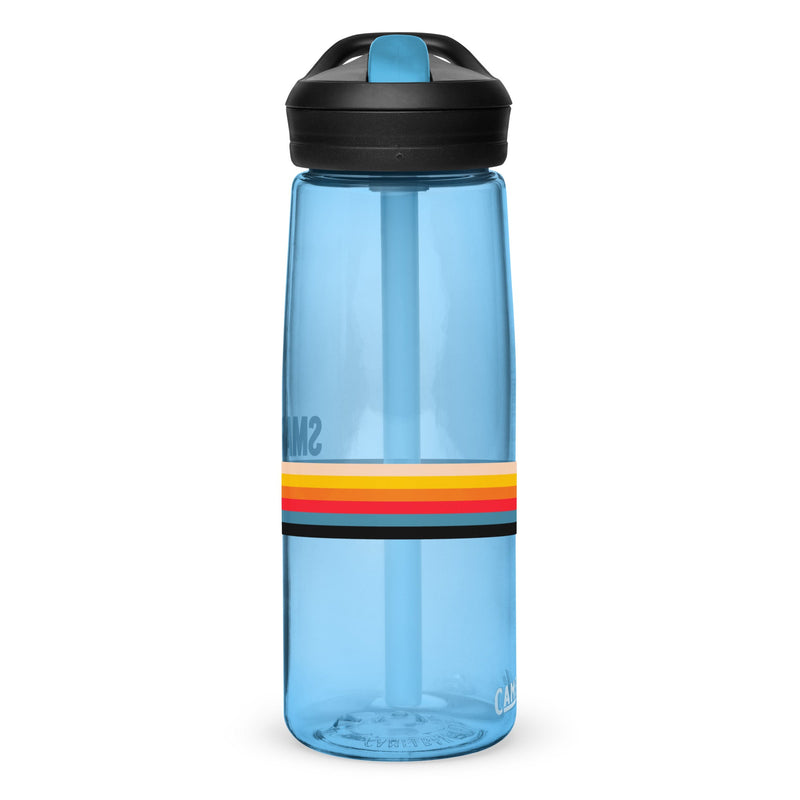 A blue water bottle with the word 'SMARTLESS' printed on it, featuring a colorful striped band around the middle and a black cap.