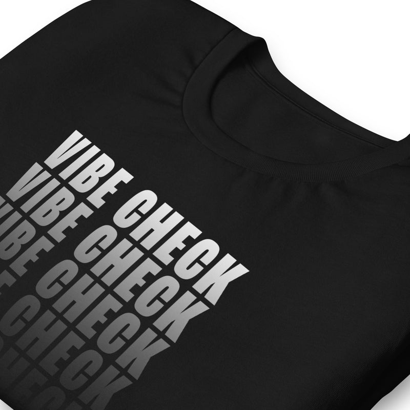 Black t-shirt featuring repeated text design saying VIBE CHECK in bold graphics.