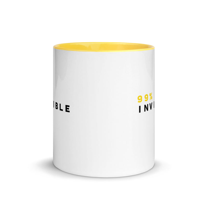 Mug with a white body and yellow interior and handle featuring the text '99% INVISIBLE' on opposite sides.