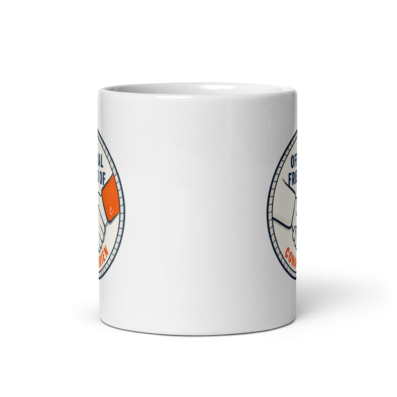 White ceramic mug. View Opposite handle.