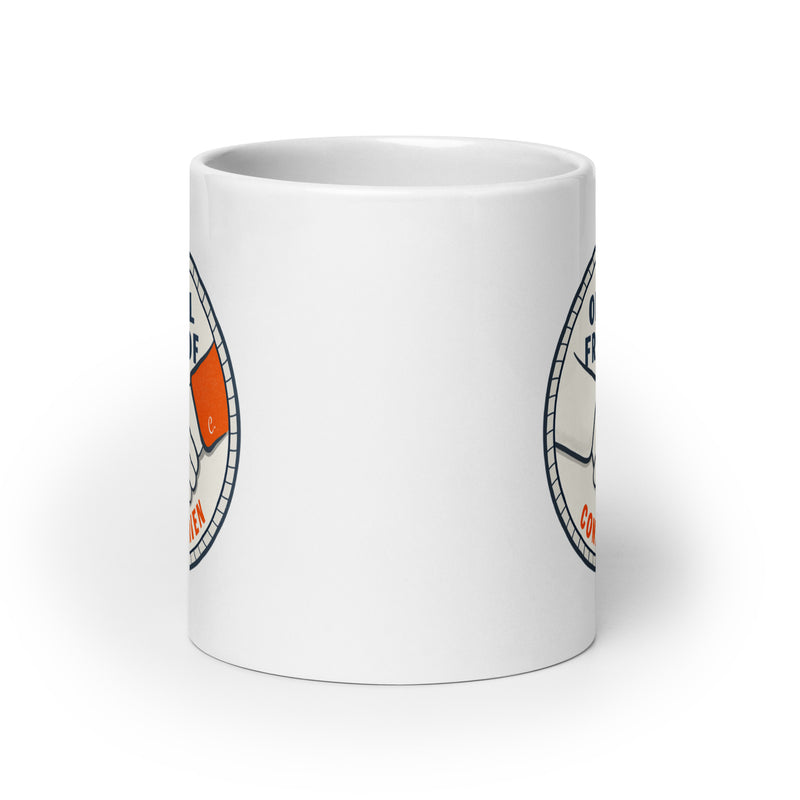 White ceramic mug. View Opposite handle.