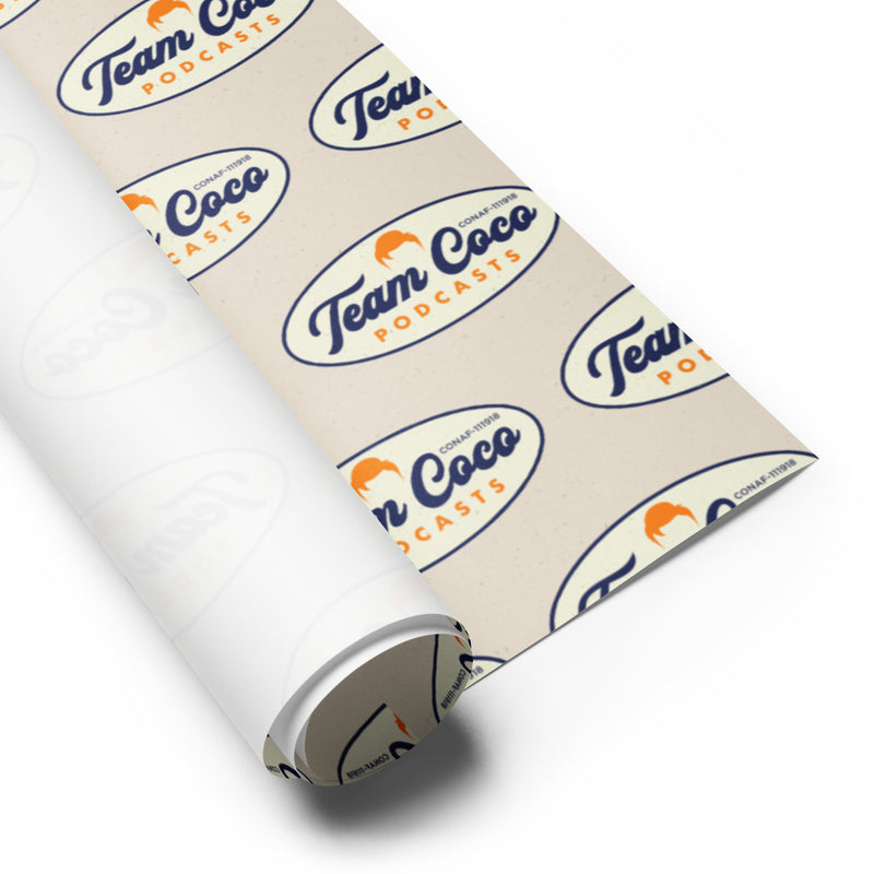 Team Coco podcast logo on a roll of wrapping paper, featuring blue and orange colors on a light background.