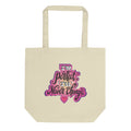 Cream colored canvas tote bag featuring colorful pink text saying 'I'm perfect, I'll never change' and a small heart graphic.