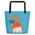 Teal beach bag with black handles, featuring an illustrated portrait of a man with orange hair, text reads 'Conan O'Brien Needs A Friend.'