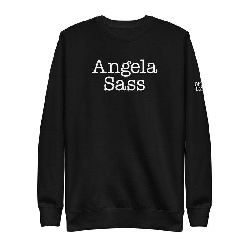 Black sweatshirt with white text reading 'Angela Sass' on the front and a partially visible, small "Office Ladies' logo on the sleeve.