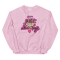 Pink sweatshirt featuring colorful pink text saying 'I'm perfect, I'll never change' and a small heart graphic.