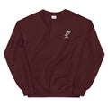 maroon sweatshirt with a small white rose graphic on the chest