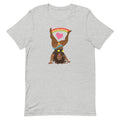 Grey t-shirt featuring the Illustration of a woman doing a cartwheelheart with heart and rainbow design elements.